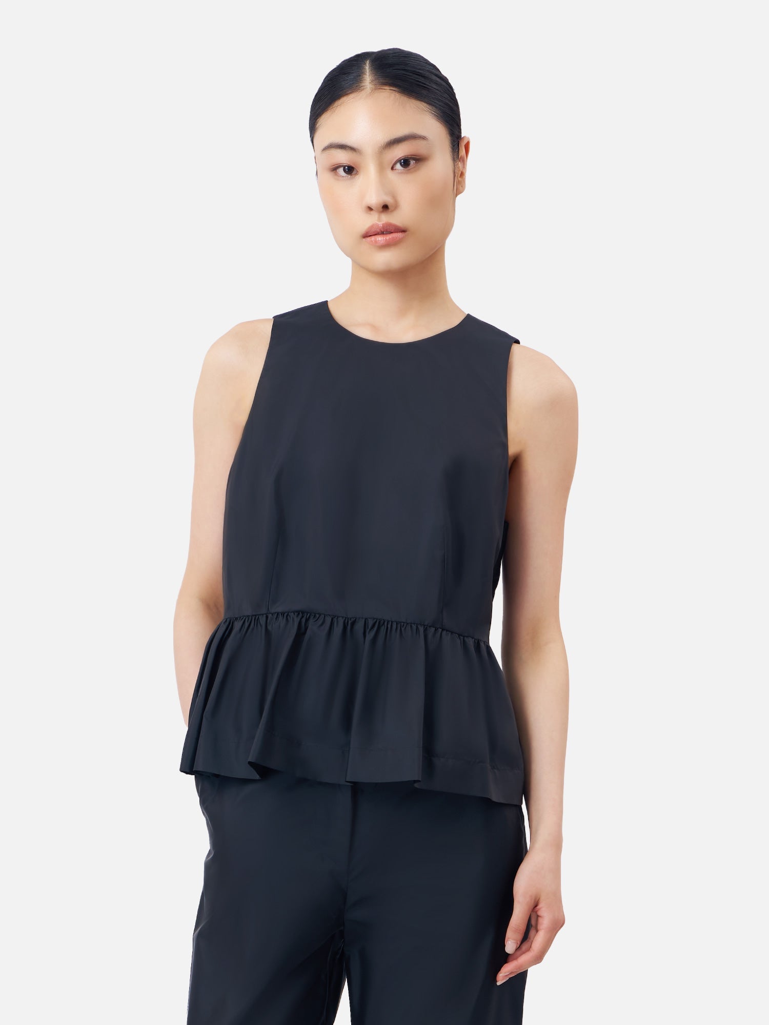 Solid Silk Sleeveless Peplum Top | Jim Thompson