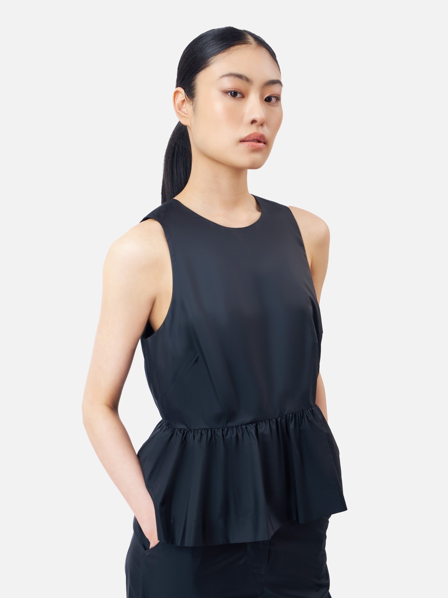 Solid Silk Sleeveless Peplum Top | Jim Thompson